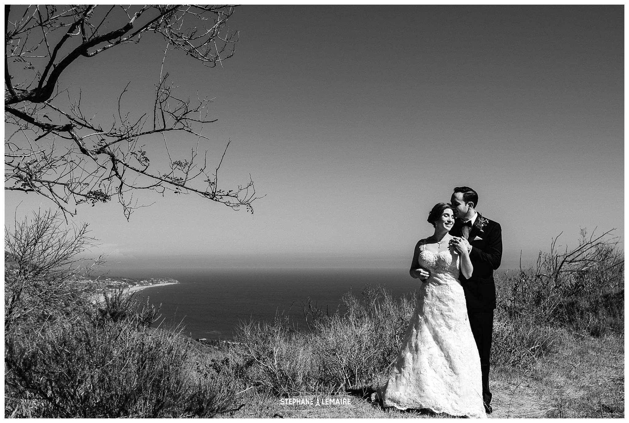 Black and White portrait of Bride and Groom by beach