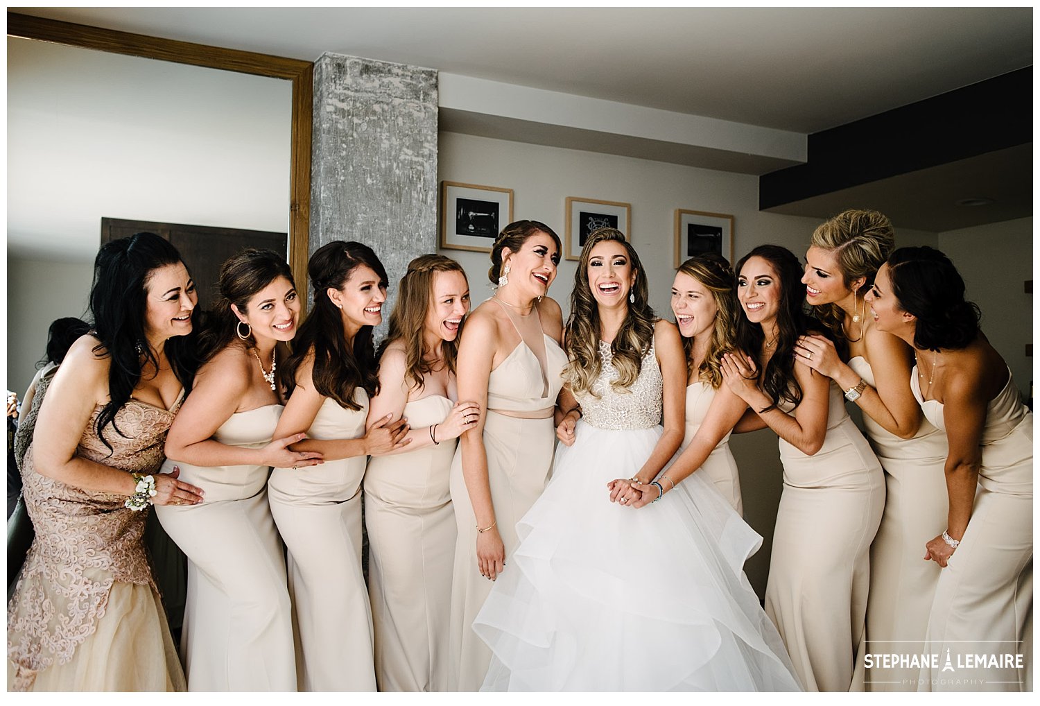 Bride with bridesmaids getting ready at Hotel Indigo in el paso texas by stephane lemaire photography