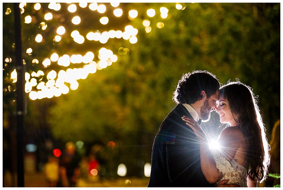 bride and groom night portrait at san jacinto plaza in el paso texas