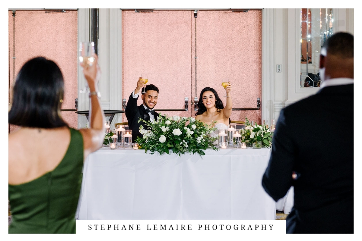 Bride and groom listening to the maid of honor speech at Hotel Paso del Norte