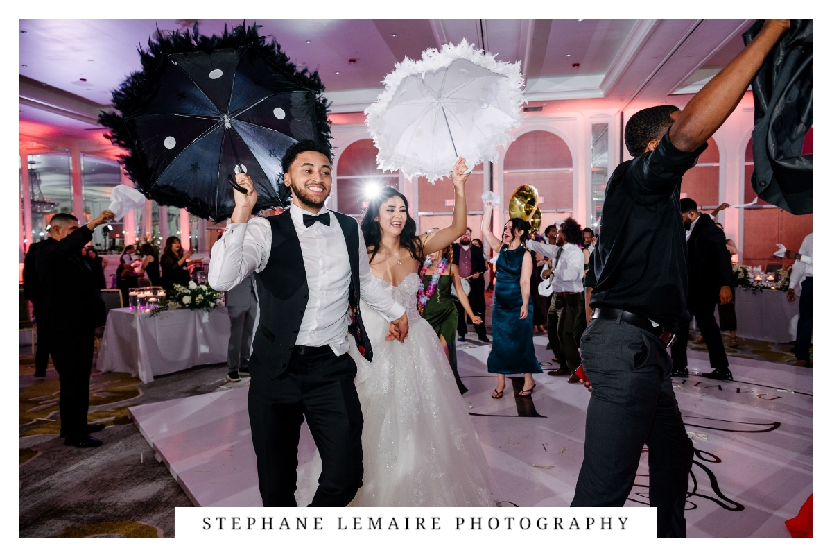 New Orleans brass band leading Jessica and David’s wedding celebration through Hotel Paso del Norte.