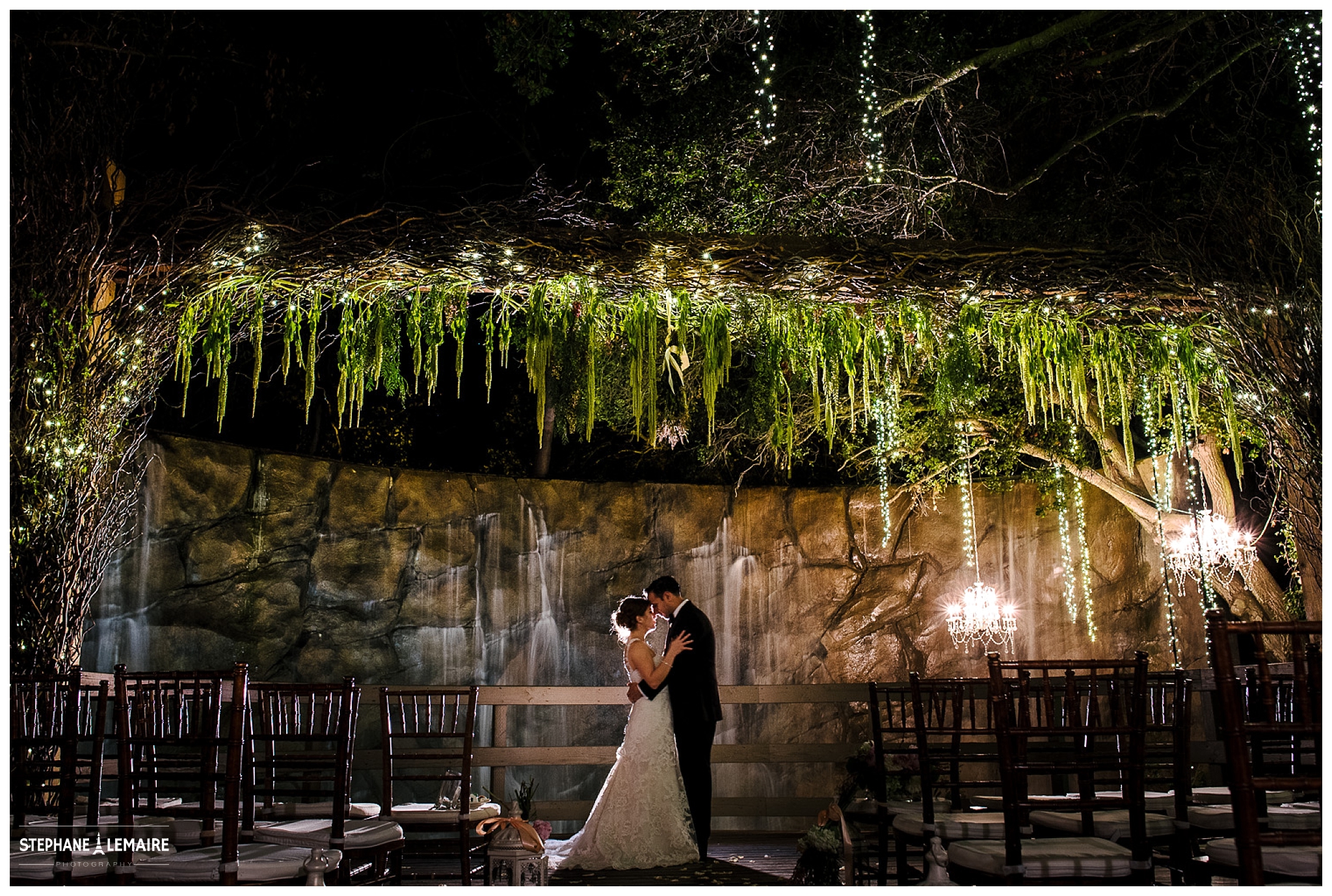 Malibu Wedding-Oak Room- Bride and Groom standing in front of waterfall