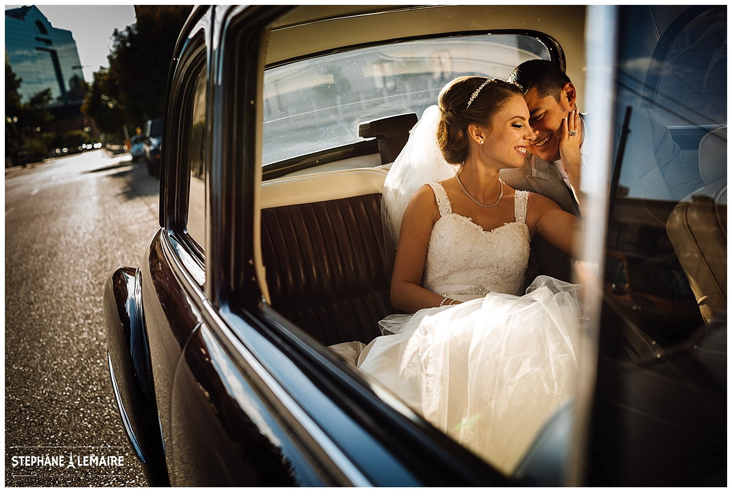 Bride and groom in vintage car in downtown el paso