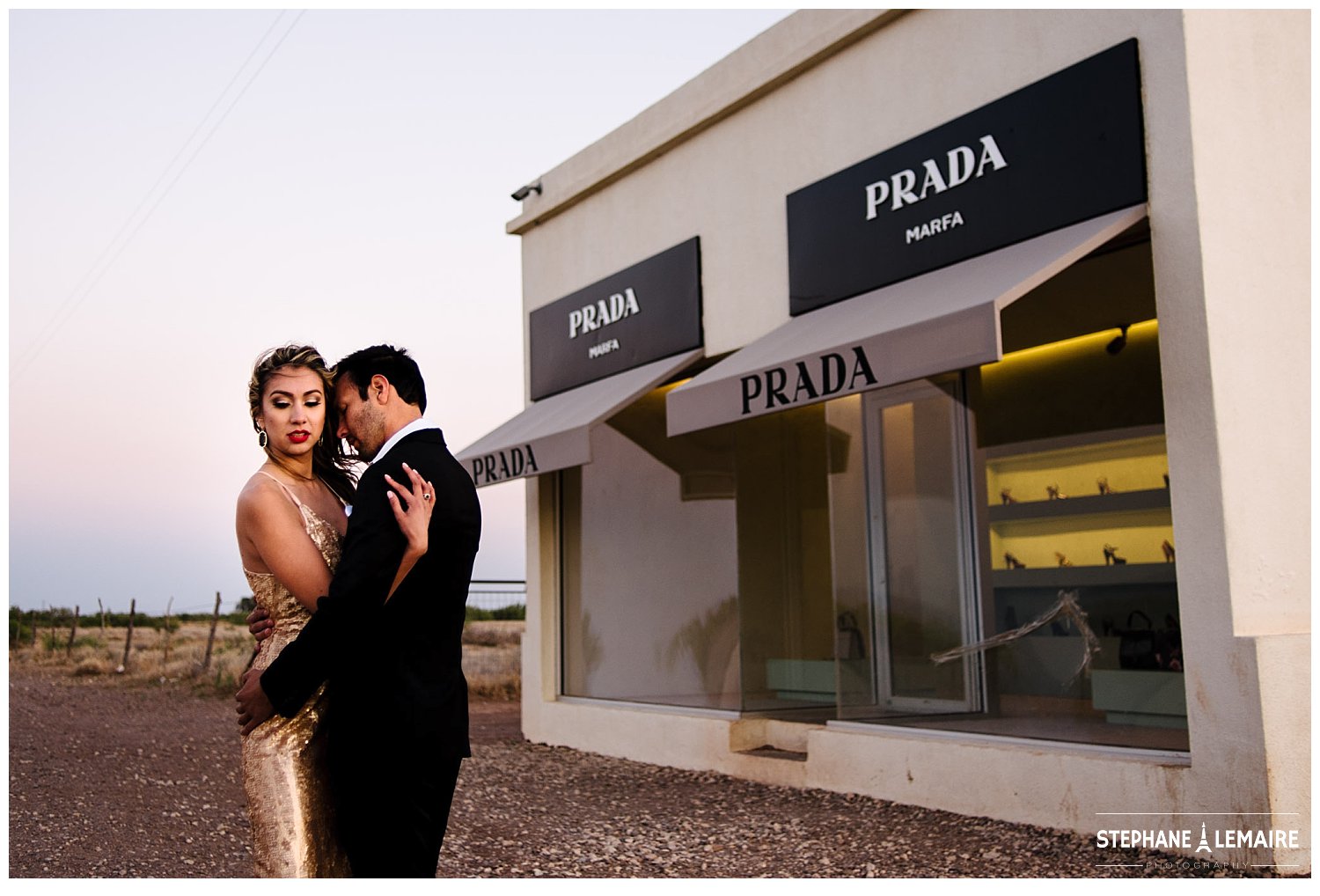Coupledressed up in gold gown and suit, in front of Prada store in Marfa.