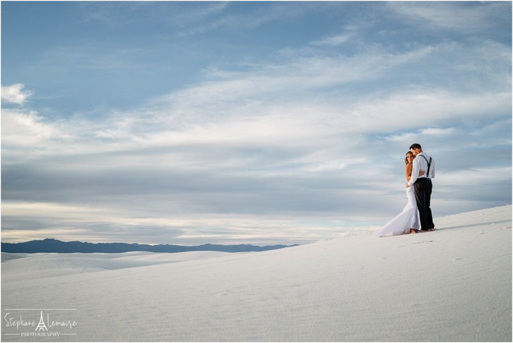 Bride and groom enjoying sunset at White Sand National monument New Mexico
