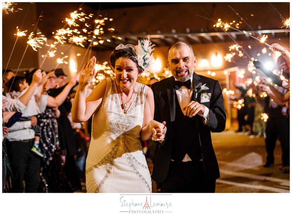 Bride and groom sparklers exit at grace gardens event center in el paso texas