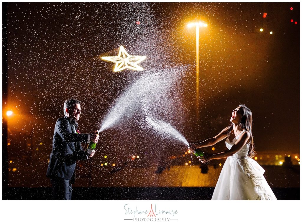 Bride and groom drinking champagne at el paso venue epic railyard by stephane lemaire photography