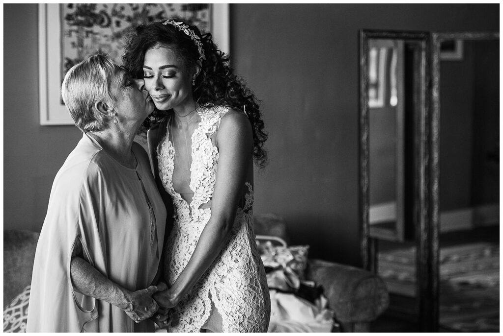 Bride and her mom sharing a moment at St Rogers Depot