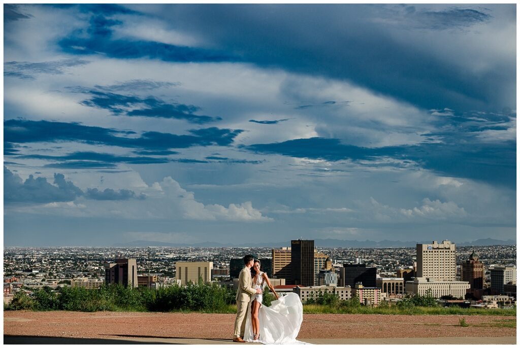 bride and groom photo with el paso as the background